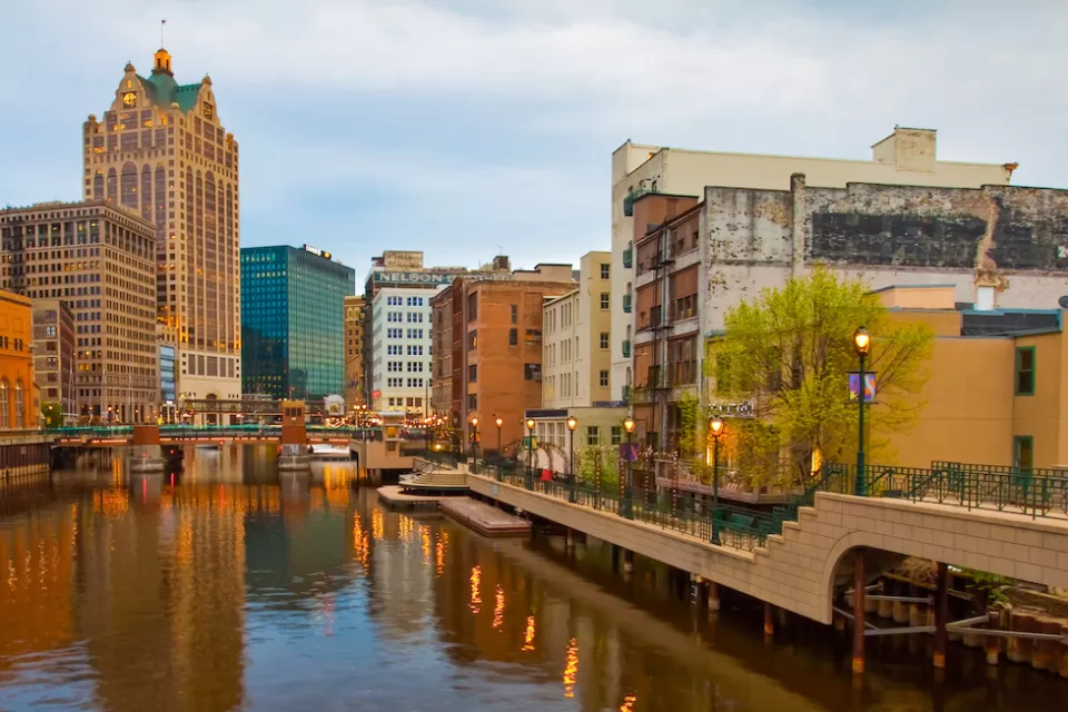 View of river and commercial buildings in downtown Milwaukee, Wisconsin.