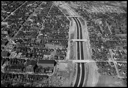 Highway construction lumbers on.