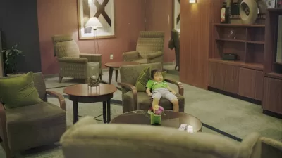 Hotel Lobby With Cute Sleeping Child