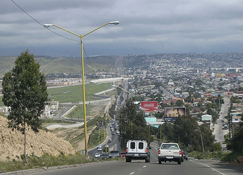 Image: Urban Development Pushing Against International Border