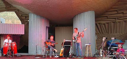 Photo: Musician Ottmar Leibert performing in the Paolo Soleri Amphitheater