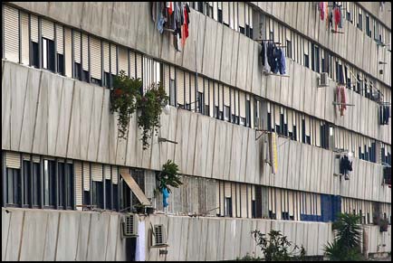 Photo: a depressing view of the front of the Corviale Building.