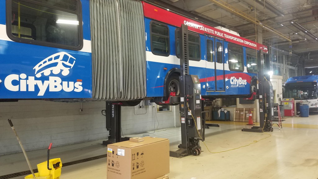 Maintenance garages require special lifts to service articulated buses.
