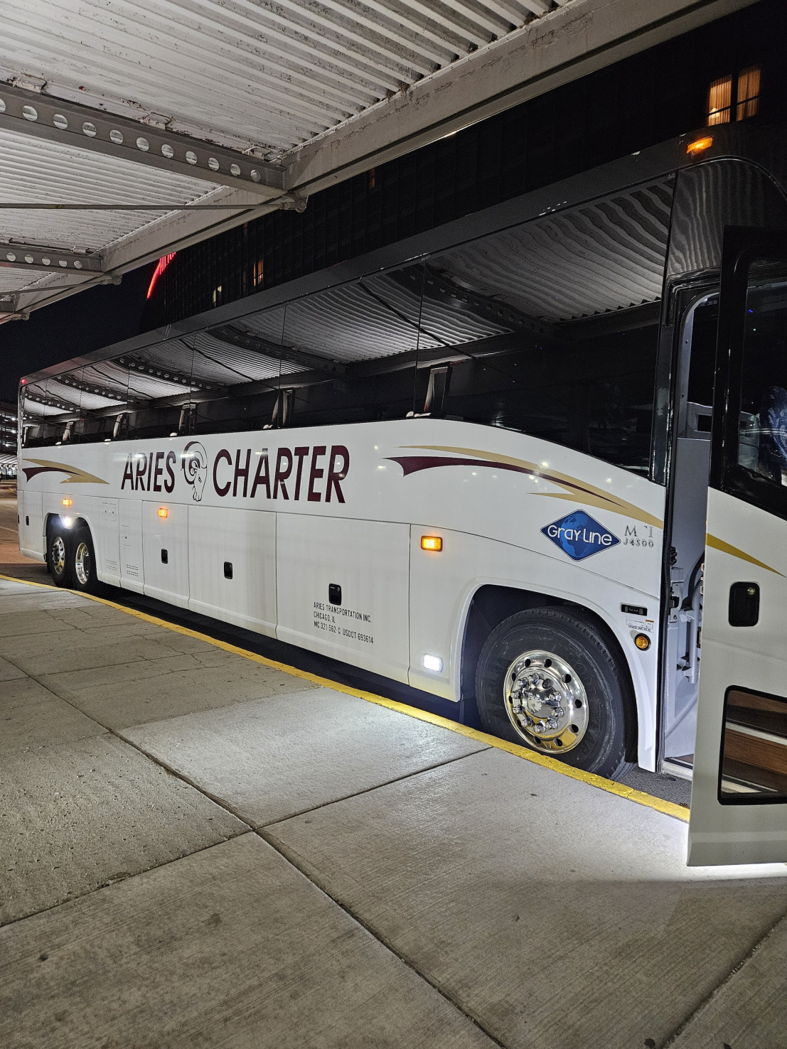 Large white charter bus