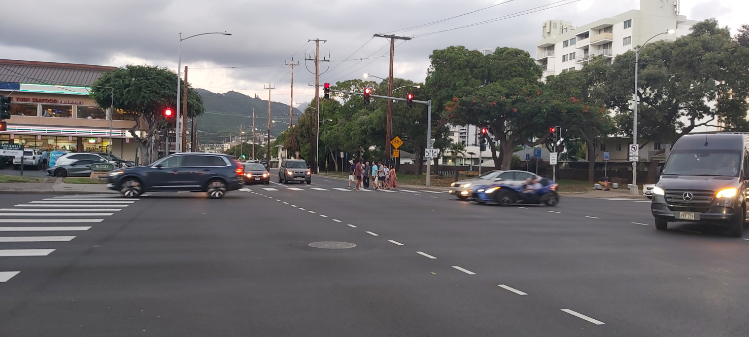 Honolulu traffic sewer -- a typical overbuilt arterial with inadequate sidewalks, crosswalks and bikeways.