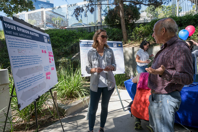 A woman speaks to an older man about the Hart Park improvement project