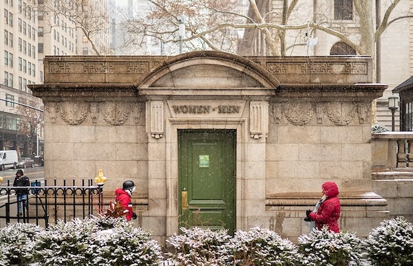 Stone public bathroom building in Bryant Park, New York.