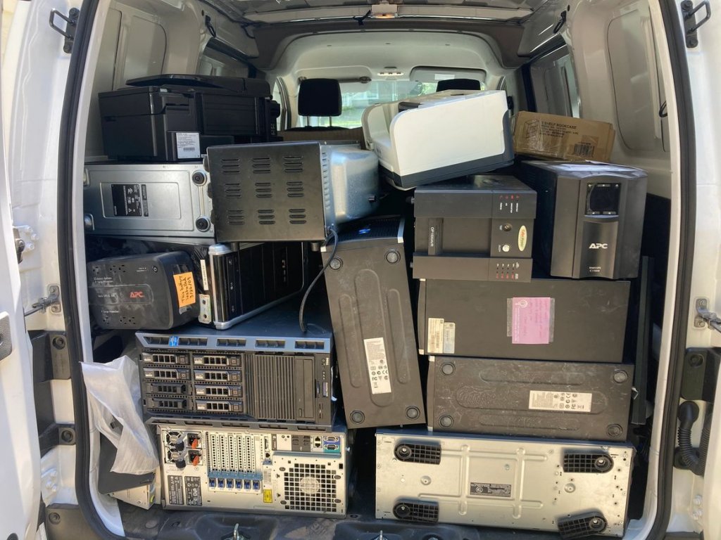 A pile of old electronic equipment.