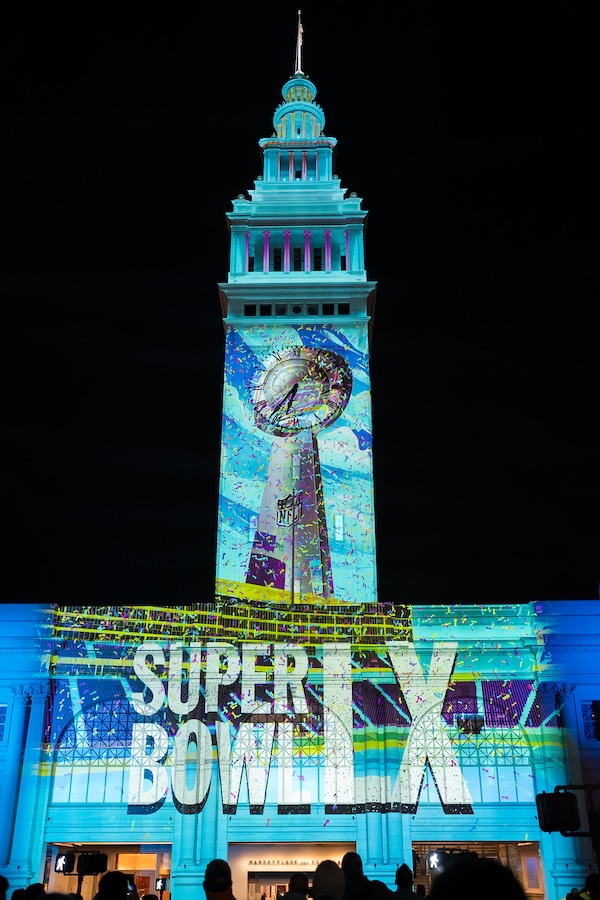Projection on San Francisco building celebrating Super Bowl.