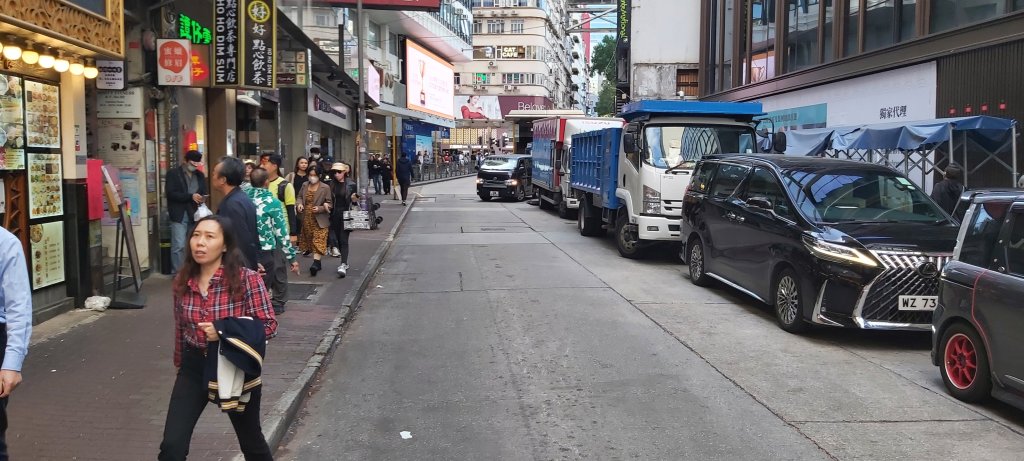 Hong Kong is crowded with pedestrians.