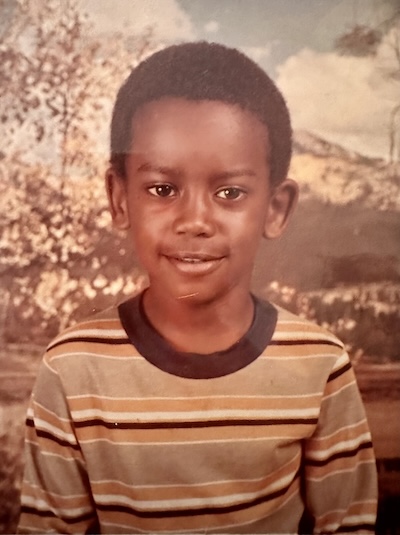 Sepia portrait photo of Charles as a child.