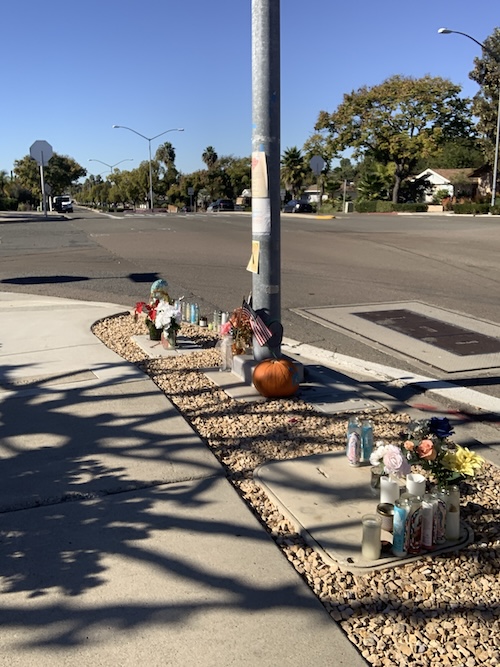 The intersection has a slight incline and four lanes of 40mph (or faster) car traffic.