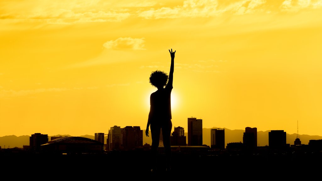 ASU City image of a sunset, yellow sky, dark city silhouette