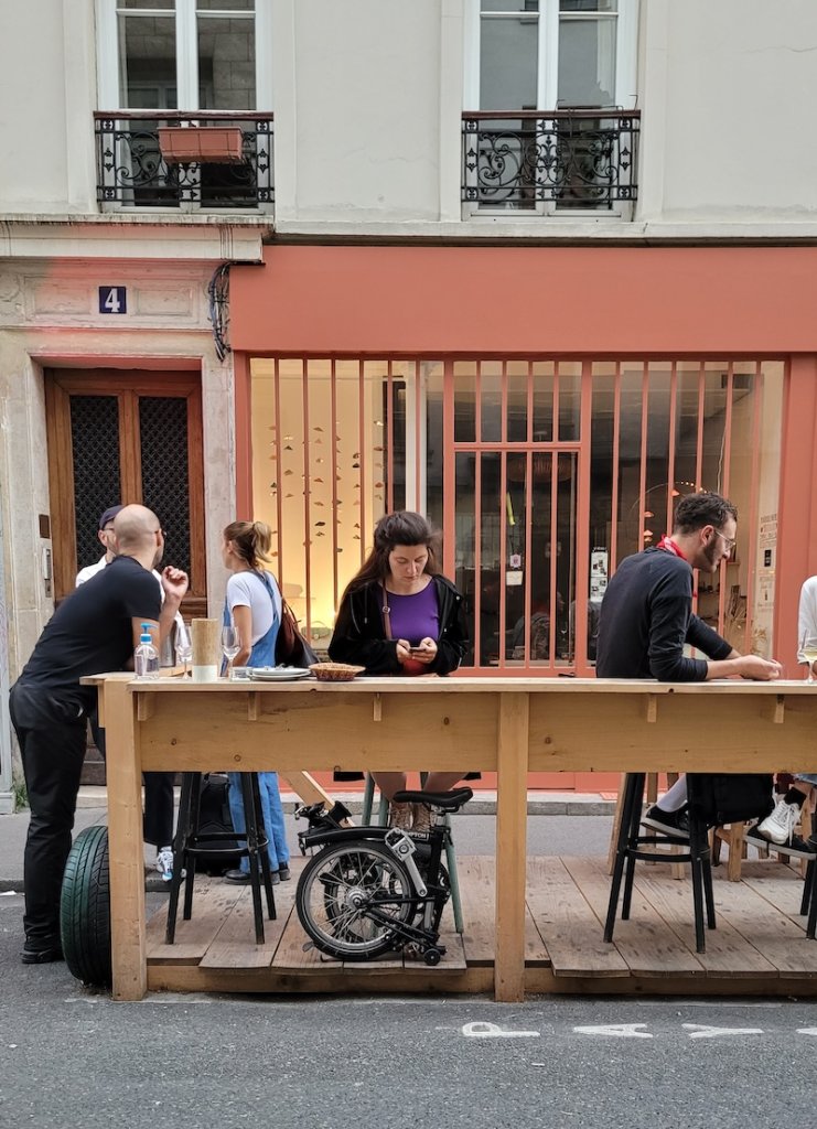 Temporary outdoor dining area in street in Paris, France during Covid.