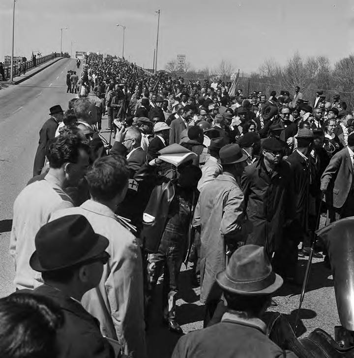 Marchers crossing the Edmund Pettus Bridge in downtown Selma, Alabama, on the first day of the Selma to Montgomery March. Credit: Alabama Department of Archives & History
