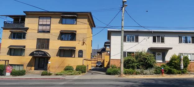 Apartment with window awnings.