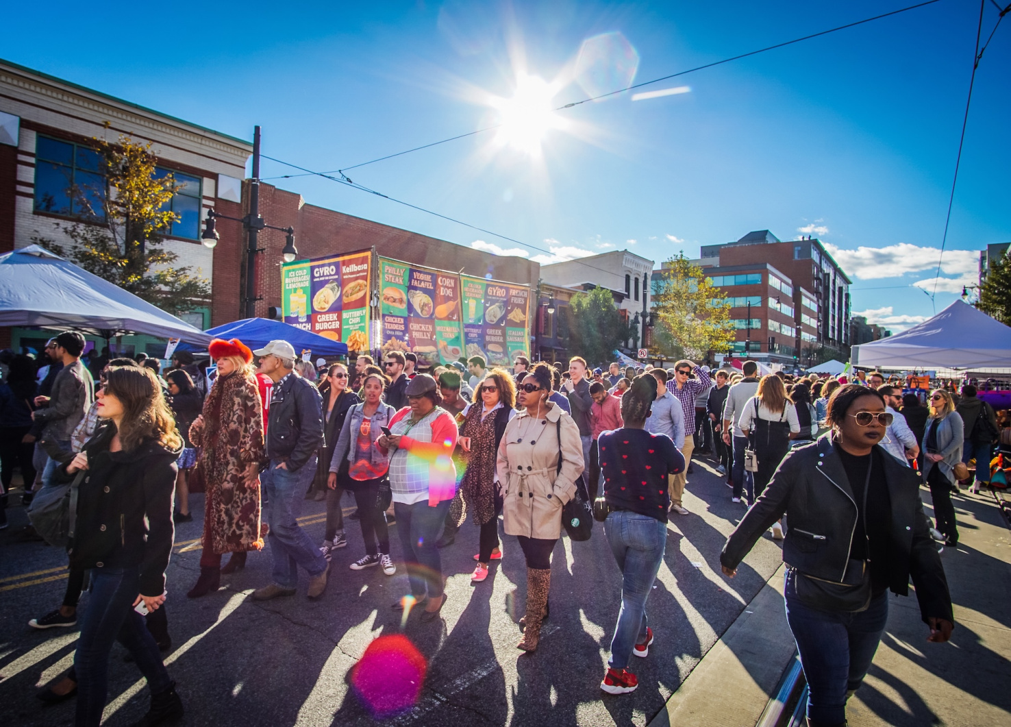 Diverse crowd in street at a festival on H Street in Washington DC.