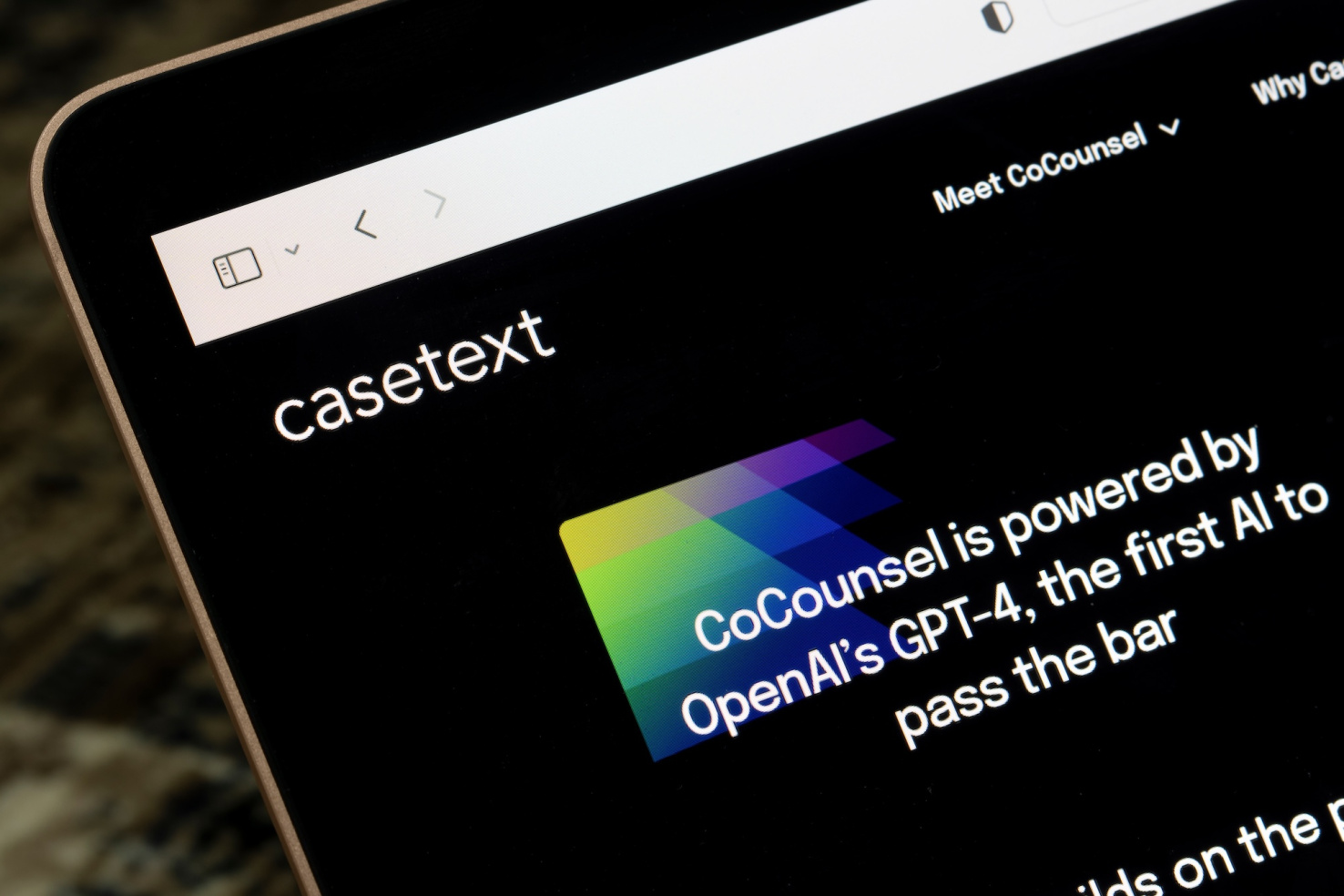 Close-up of homepage for Casetext legal AI platform on iPad or MacBook.