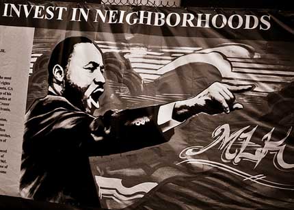 Photo:A sign on a fence in Roxbury, Boston
