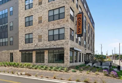 Multi-story light brick apartment building in Milwaukee, Wisconsin.