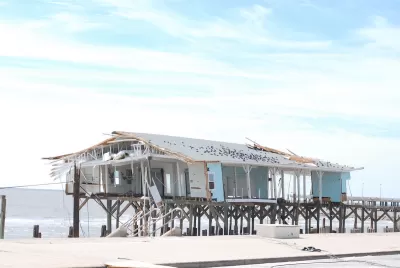 damaged building on pier in Gulf of Mexico in Galveston, Texas after Hurricane Ike.