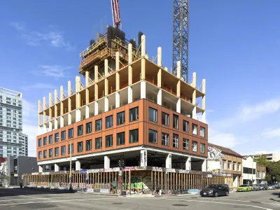 Mid-rise residential building under construction in Oakland, California.