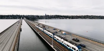Sound Transit light rail train traveling across floating bridge.