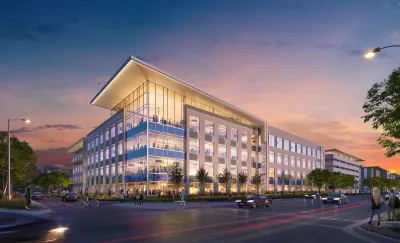 A rendering of one of the district's buildings, which is white with many windows and about four stories tall.