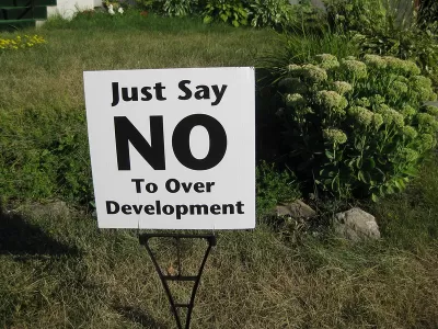 Clse-up of "Just Say No To Over Development" yard sign on green lawn