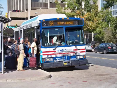 Passengers lined up to board city bus in Washington, D.C. to Dulles Airport