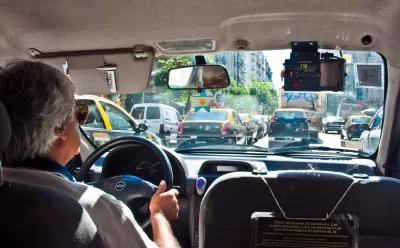 Interior of taxi with driver in Buenos Aires, Argentina