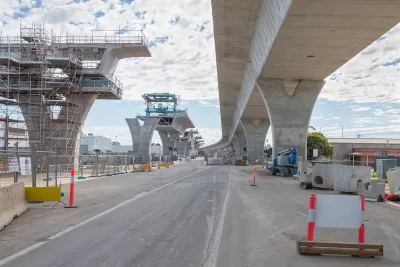 View of highway overpass under construction from underneath.