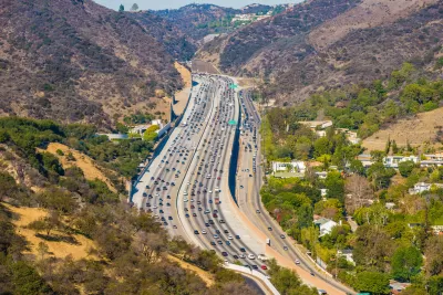 Traffic on the 405 interstate freeway through the Sepulveda Pass at Getty Center Drive in Los Angeles, California