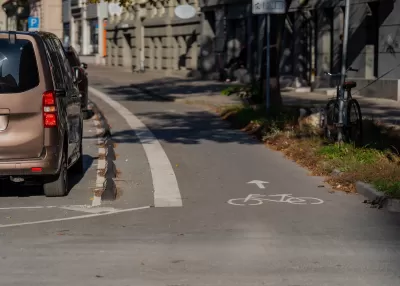 Parking protected bike lane in Riga, Latvia.