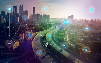 View of city skyline with overlay of icons indicating smart city connectivity.