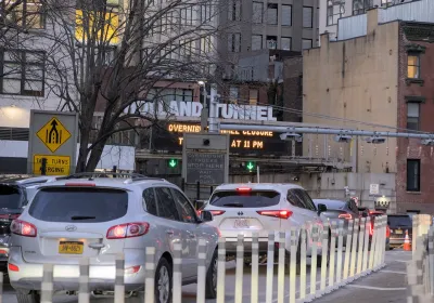 Cars in traffic entering Holland Tunnel in New York City.