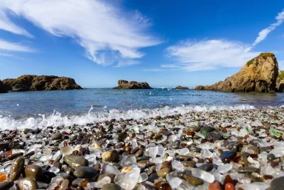Close-up of rounded weathered multicolored glass pieces on Glass Beach in Fort Bragg, California.