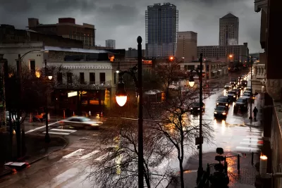 View of rainy Sixth Street with grey sky in Austin, Texas