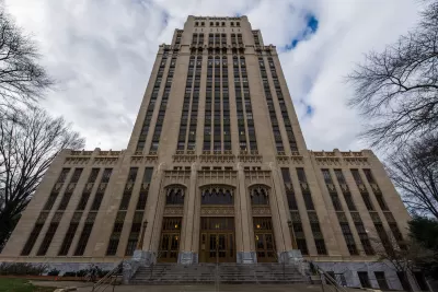 View looking up at high-rise Art Deco Atlanta City Hall building.