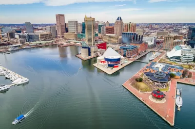 Aerial view of Baltimore's Inner Harbor with downtown skyline.