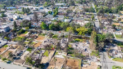 Aerial view of homes and businesses destroyed by Altadena wildfire.