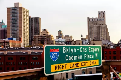 View of green Bklyn-Qns Expwy sign on freeway