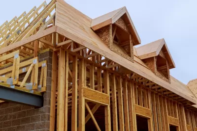 Wood-frame homes under construction.