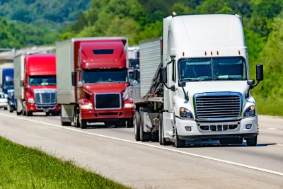 Line of 18-wheeler trucks on a highway in Tennessee