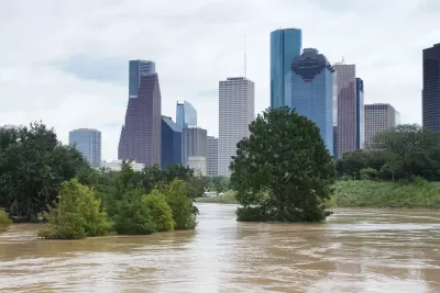 Flooded park agains the downtown Houston skyline