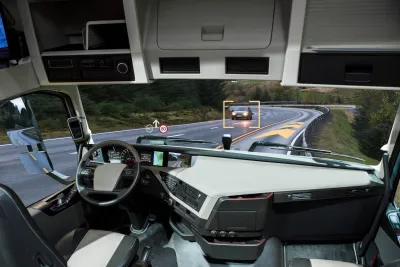 Inside of self-driving truck on road.