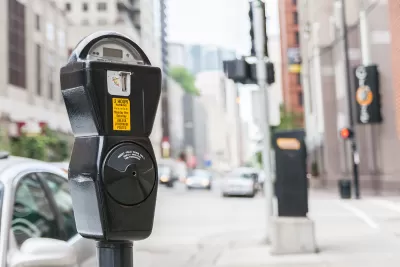 Close-up of standard grey parking meter on Chicago street.