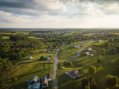 Aerial view of green rural community with houses in Pennsylvania.