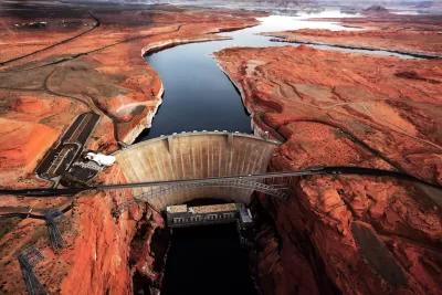 Aerial view of Glen Canyon Dam on Colorado River among red rocks