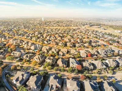 Aerial view of suburban sprawl with large single-family homes near Dallas, Texas.